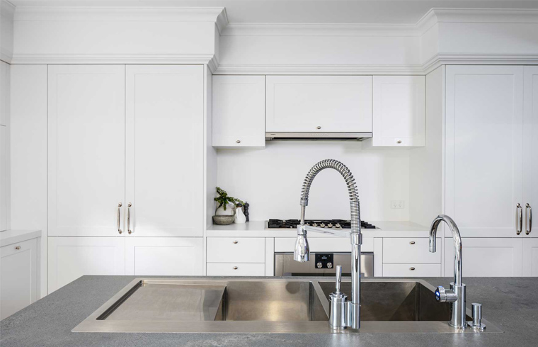 White PVC Kitchen With Grey Quartz Countertop